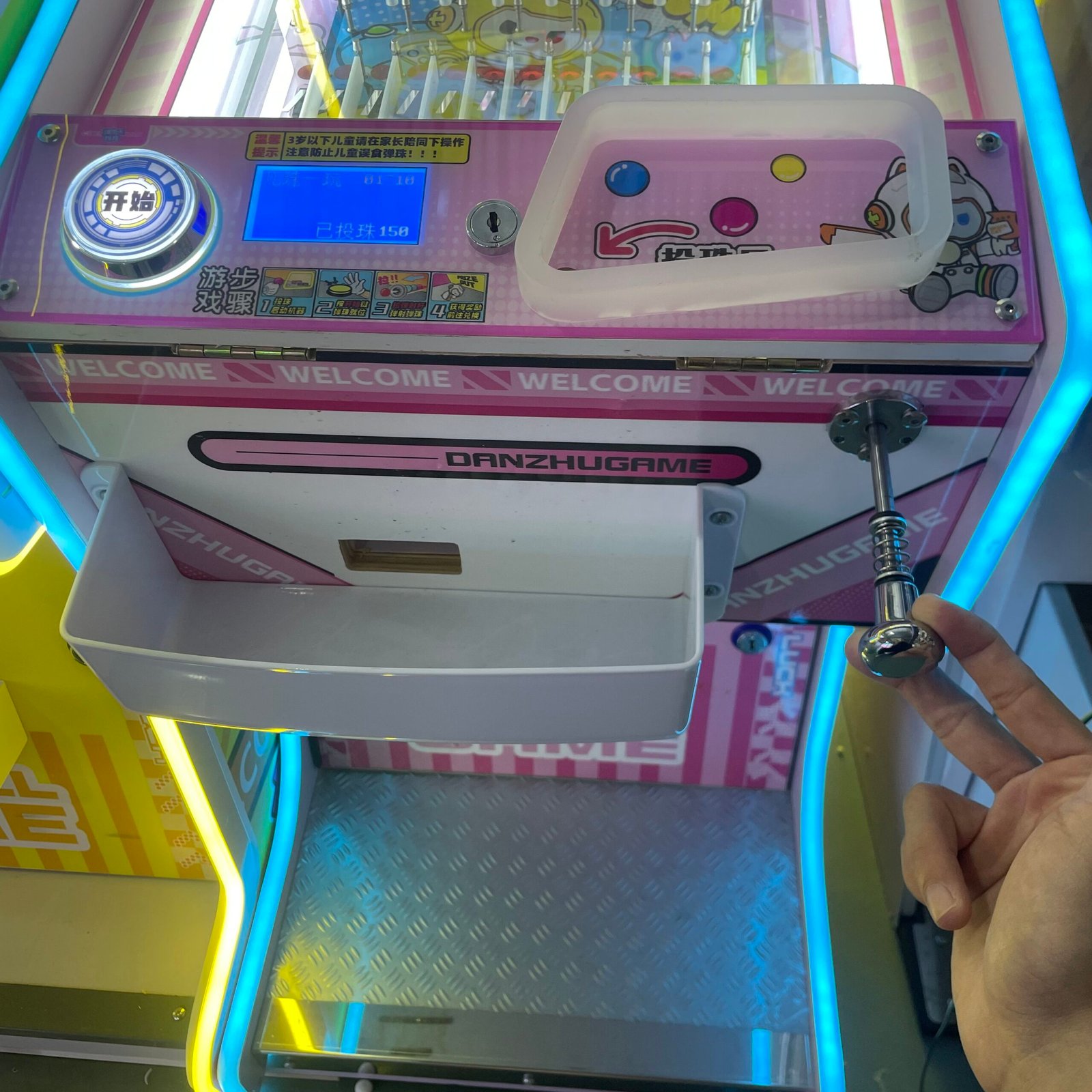 Pinball machine launch handle used to release the ball into the arcade gameplay board