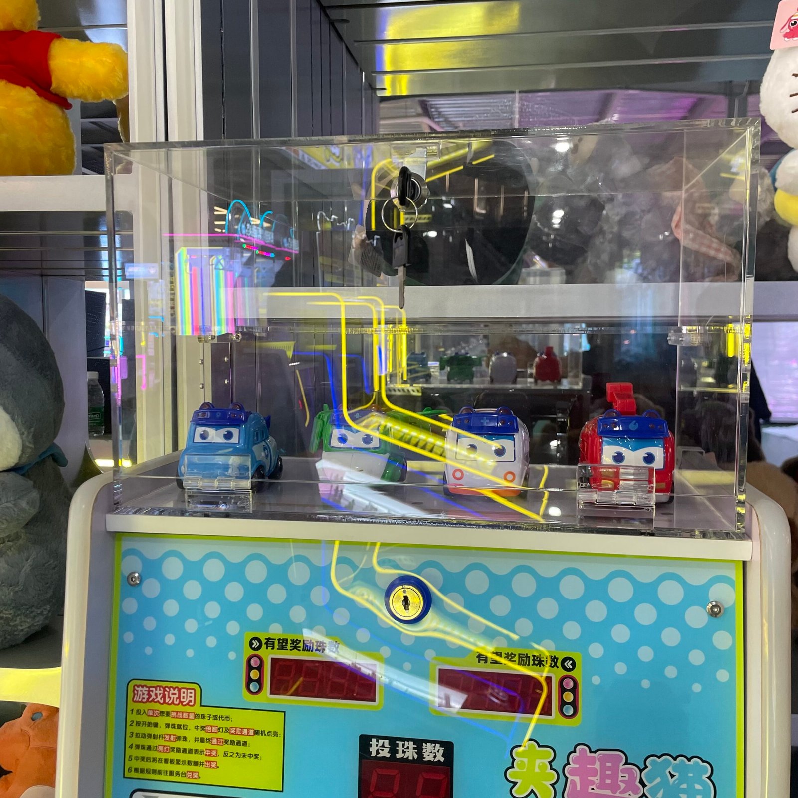 Arcade pinball machine real installation photo in amusement center showing LED cabinet design