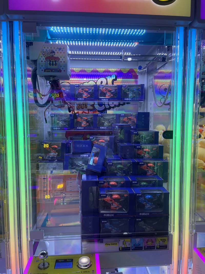 Super Claw Gen 5 front cabinet with LED lighting and prize display window